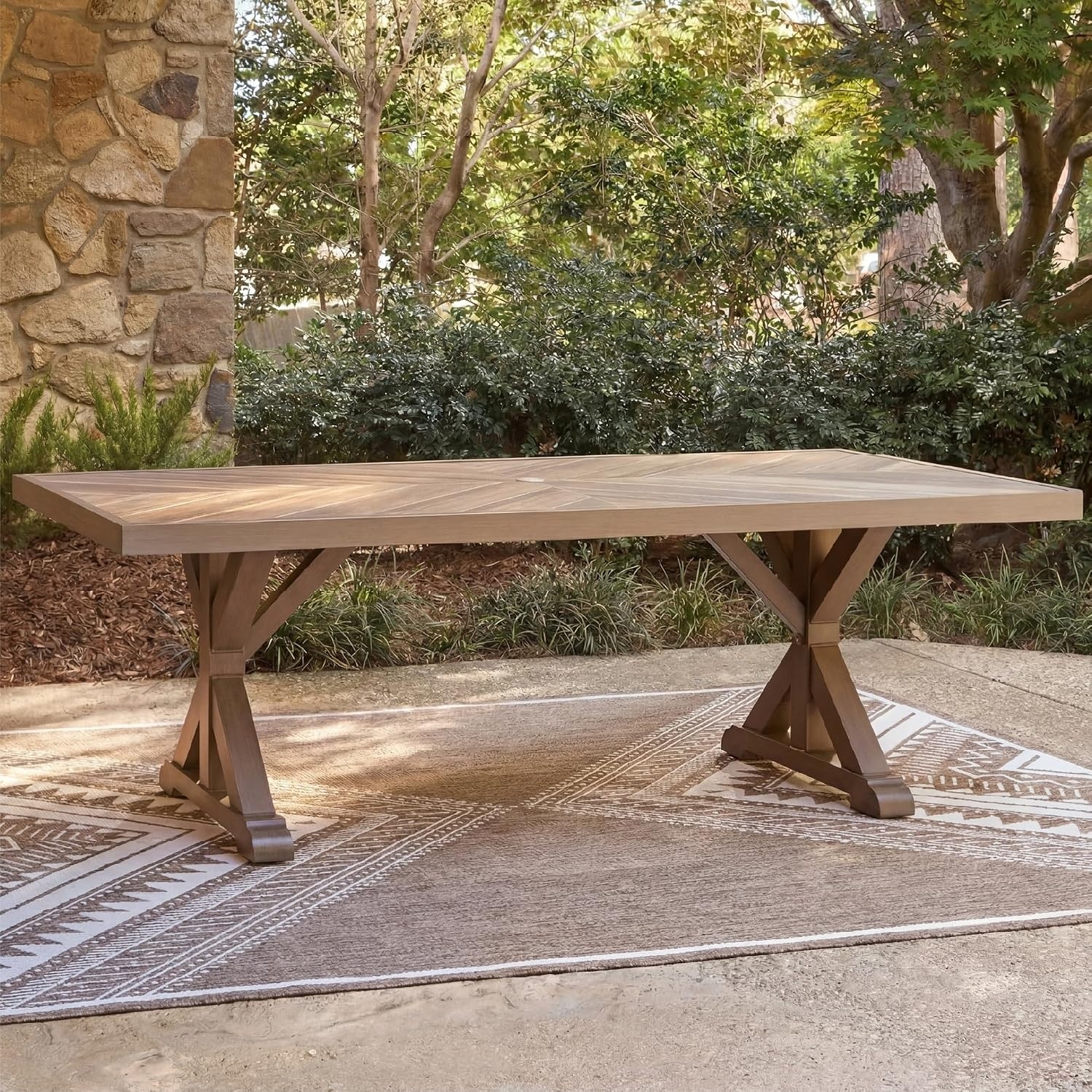 image:imageSignature Design by Ashley Carmel Bay Casual Weather and Rust Resistant Outdoor Dining Table with Porcelain Tabletop and Umbrella Hole Grayish Brown