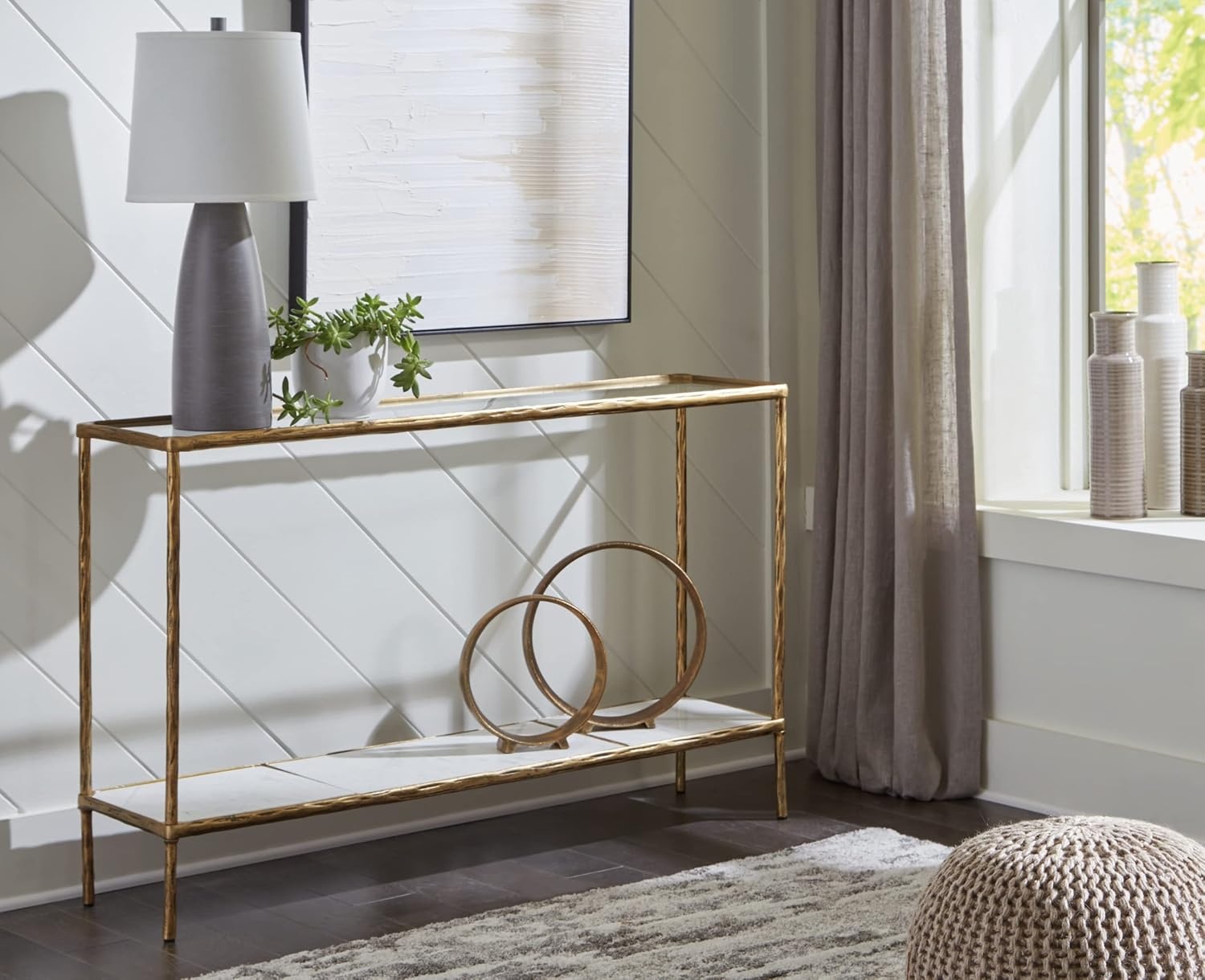 image:imageSignature Design by Ashley Ryandale Console Sofa Table Glass Tabletop White Marble Lower Shelf Sand Casted Aluminum 52 W x 125 D x 3275 H Antique Brass Finish