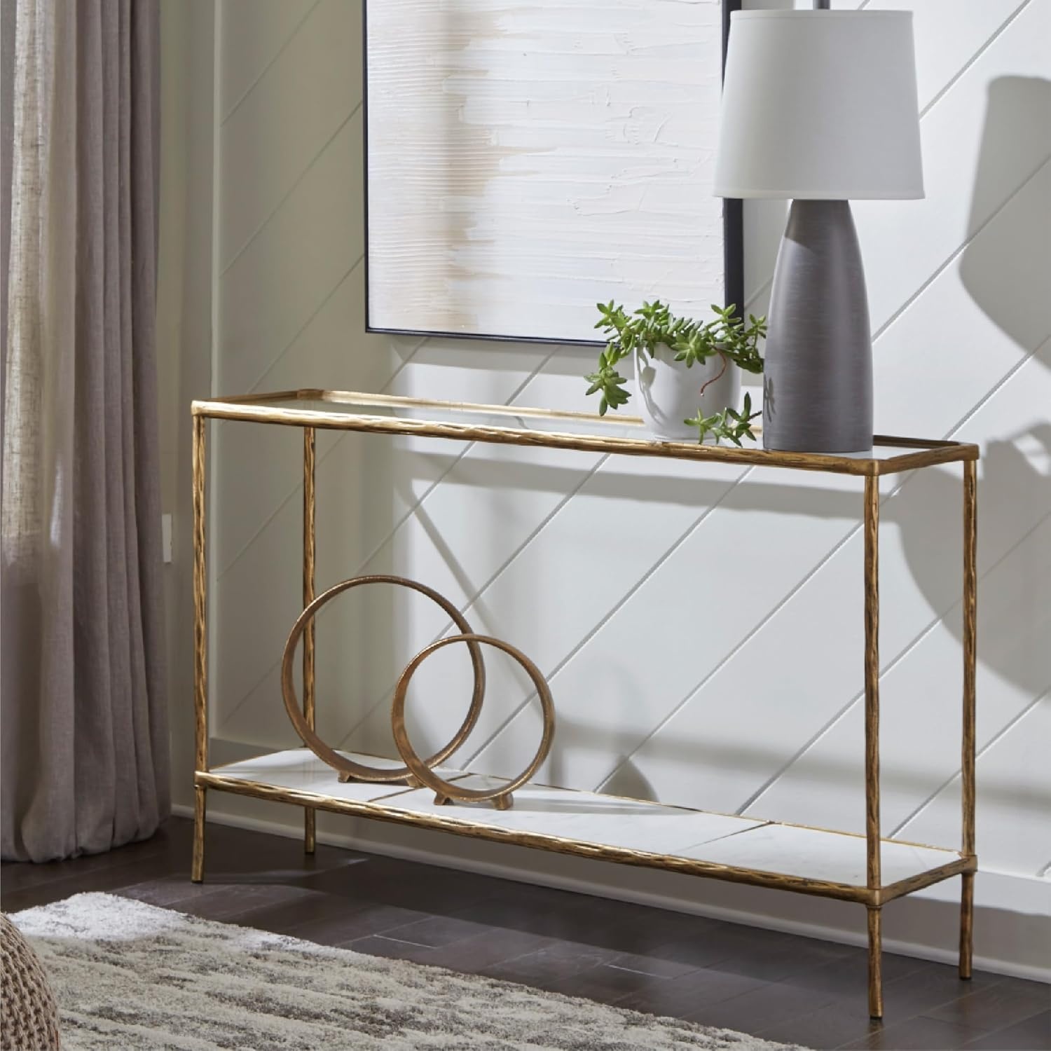 image:imageSignature Design by Ashley Ryandale Console Sofa Table Glass Tabletop White Marble Lower Shelf Sand Casted Aluminum 52 W x 125 D x 3275 H Antique Brass Finish