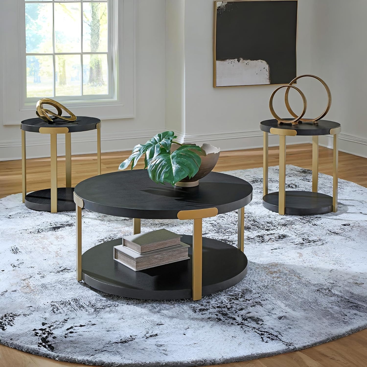 image:imageSignature Design by Ashley Shylore 3Piece Round Coffee Table Set with Casters Living Room Table Set Melamine Engineered Wood and Metal Frame Black and Goldtone