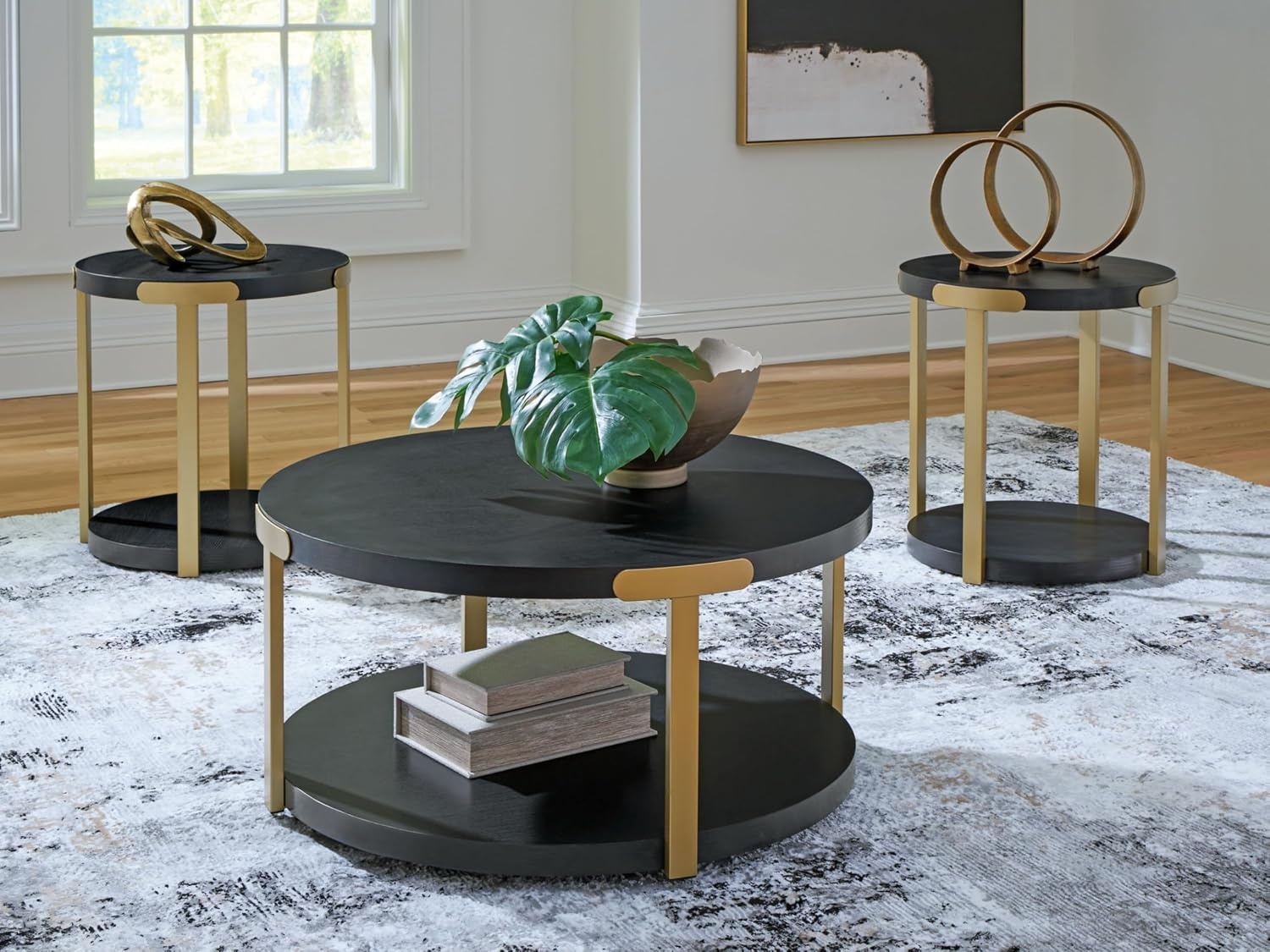 image:imageSignature Design by Ashley Shylore 3Piece Round Coffee Table Set with Casters Living Room Table Set Melamine Engineered Wood and Metal Frame Black and Goldtone